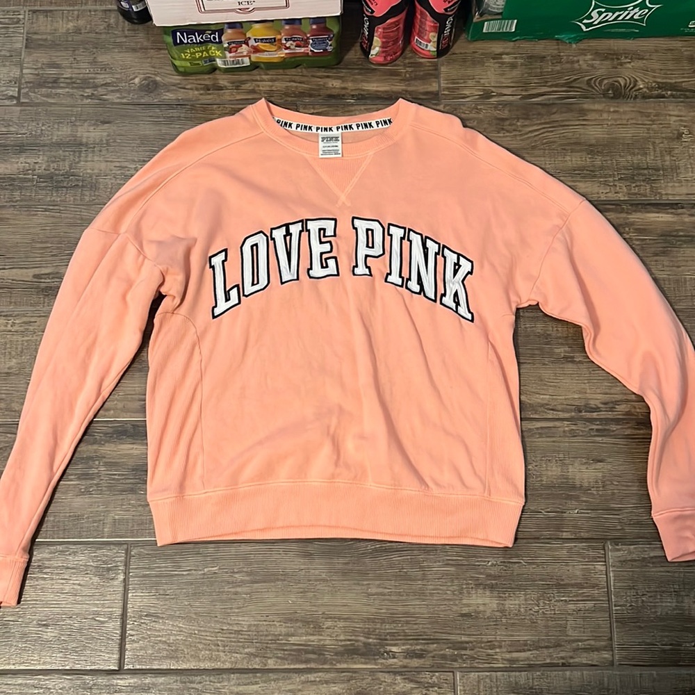 PINK crewneck salmon pink color size small it’s super soft on the inside